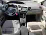 2012 Honda Civic with VIN 2HGFB2F22CH515706, listed as a Copart auction lot 71010745 with 181,438 mi miles and Salvage title. Bid and sale history available at DreamBid. Image 8.