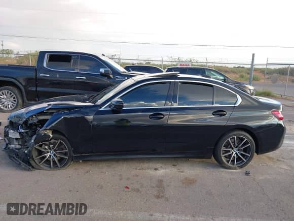 2019 BMW 3 Series 330i with VIN WBA5R1C51KFH29794, listed as a IAAI auction lot 43089716 with Not provided miles and . Bid and sale history available at DreamBid. Image 14.