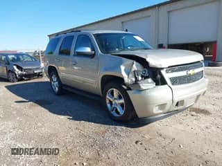 2014 Chevrolet Tahoe LTZ с VIN 1GNSCCE05ER223171, выставлен на аукционе IAAI как лот 41329685 с пробегом 150 328 миль миль и . История ставок и продаж доступна на DreamBid. Изображение 1.