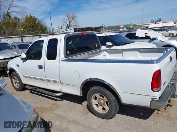 2003 Ford F-150 XL with VIN 1FTRX17W03NA37401, listed as a IAAI auction lot 41724466 with 350,336 mi miles and . Bid and sale history available at DreamBid. Image 15.