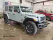 2024 Jeep Wrangler Rubicon with VIN 1C4RJXR66RW100859, listed as a Copart auction lot 58377805 with 9,426 mi miles and Salvage title. Bid and sale history available at DreamBid. Image 4.