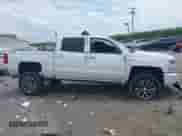 2016 Chevrolet Silverado 1500 LT with VIN 3GCUKREC4GG363667, listed as a IAAI auction lot 42617337 with 149,385 mi miles and . Bid and sale history available at DreamBid. Image 13.