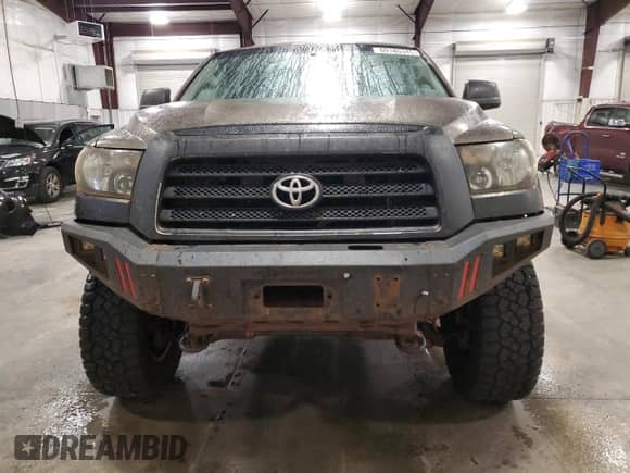 2008 Toyota Tundra z VIN 5TBDV54168S519218, wystawiony jako Copart lot #69140345 z przebiegiem 339 097 mil mil oraz Szkoda całkowita • Salvage title. Historia ofert i sprzedaży dostępna na DreamBid. Obrazek 5.