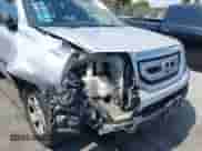 2009 Honda Pilot LX with VIN 5FNYF38219B025285, listed as a IAAI auction lot 43193641 with 120,873 mi miles and . Bid and sale history available at DreamBid. Image 6.