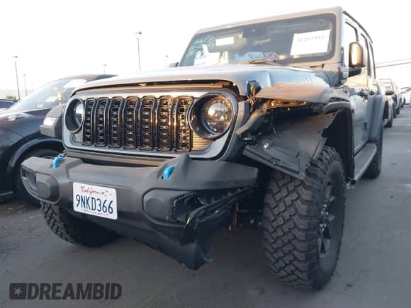 2024 Jeep Wrangler Sport S with VIN 1C4RJXN64RW337985, listed as a IAAI auction lot 41261982 with 1,845 mi miles and . Bid and sale history available at DreamBid. Image 6.