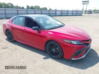 2023 Toyota Camry TRD with VIN 4T1KZ1AK3PU083507, listed as a IAAI auction lot 43204645 with 61,889 mi miles and . Bid and sale history available at DreamBid. Image 1.
