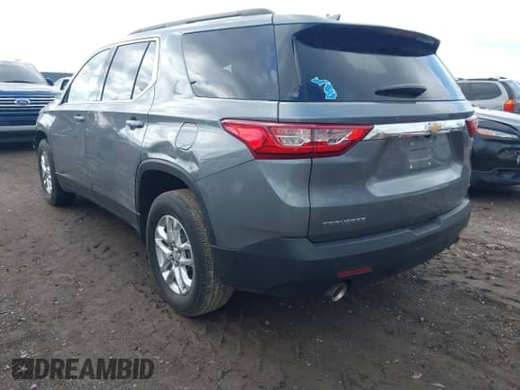 2021 Chevrolet Traverse LT Cloth z VIN 1GNERGKW3MJ157258, wystawiony jako IAAI lot #42169401 z przebiegiem 34 992 mil mil oraz . Historia ofert i sprzedaży dostępna na DreamBid. Obrazek 3.