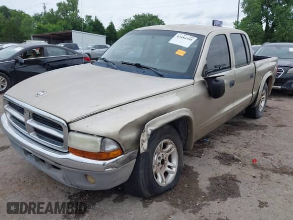 2004 Dodge Dakota SLT с VIN 1D7HL48N84S619527, выставлен на аукционе IAAI как лот 42484398 с пробегом 275 998 миль миль и . История ставок и продаж доступна на DreamBid. Изображение 2.