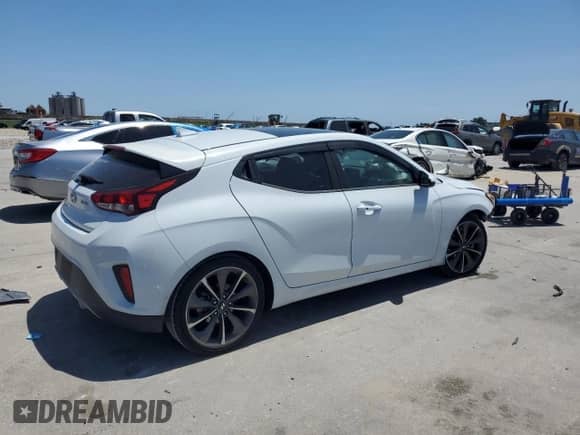 2019 Hyundai Veloster Premium с VIN KMHTG6AF9KU003467, выставлен на аукционе Copart как лот 57110235 с пробегом 94 581 миль миль и Списание • Salvage title. История ставок и продаж доступна на DreamBid. Изображение 3.