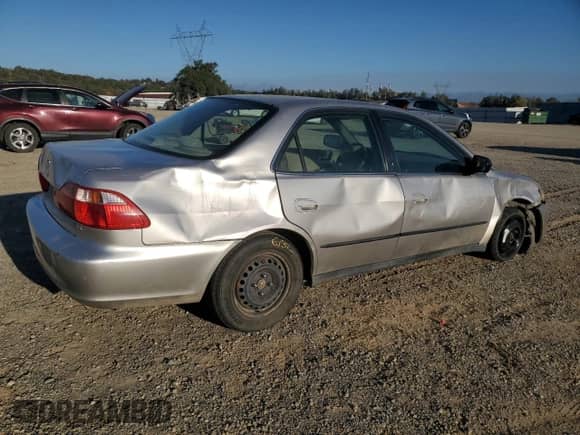 1999 Honda Accord LX с VIN JHMCG6653XC012715, выставлен на аукционе Copart как лот 69753775 с пробегом 203 374 миль миль и Списание • Salvage title. История ставок и продаж доступна на DreamBid. Изображение 3.