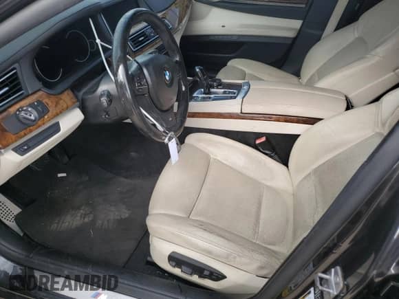 2014 BMW 7 Series 740Li with VIN WBAYE4C52ED137991, listed as a Copart auction lot 54702135 with 145,375 mi miles and Salvage title. Bid and sale history available at DreamBid. Image 7.