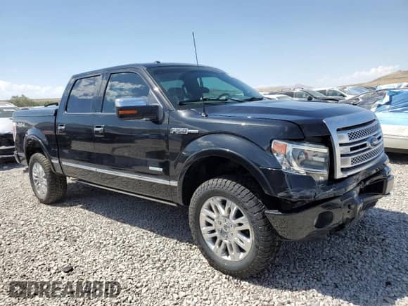 2014 Ford F-150 FX4 with VIN 1FTFW1ET7EFB69518, listed as a Copart auction lot 65610935 with 141,488 mi miles and Salvage title. Bid and sale history available at DreamBid. Image 4.