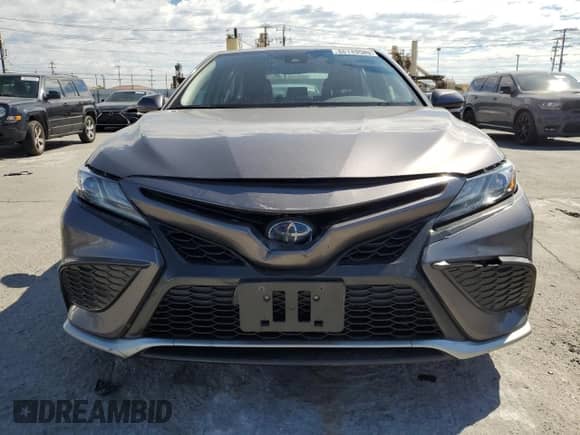 2021 Toyota Camry Hybrid XSE with VIN 4T1K31AK9MU565539, listed as a Copart auction lot 86149585 with 115,658 mi miles and Salvage title. Bid and sale history available at DreamBid. Image 5.