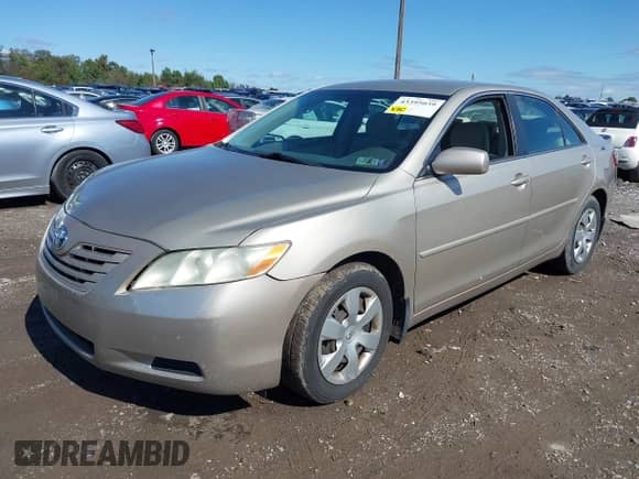 2007 Toyota Camry LE with VIN 4T1BK46KX7U019818, listed as a IAAI auction lot 43395039 with 210,676 mi miles and . Bid and sale history available at DreamBid. Image 2.