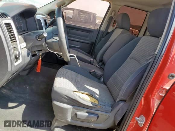 2010 Dodge 1500 ST with VIN 1D7RB1GK8AS126472, listed as a Copart auction lot 50351295 with 220,614 mi miles and Salvage title. Bid and sale history available at DreamBid. Image 7.