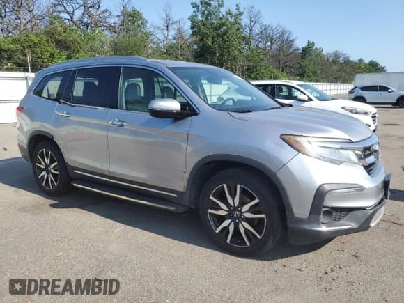 2019 Honda Pilot Touring 8-Passenger z VIN 5FNYF6H90KB008028, wystawiony jako Copart lot #66518825 z przebiegiem 90 735 mil mil oraz Szkoda całkowita • Salvage title. Historia ofert i sprzedaży dostępna na DreamBid. Obrazek 4.