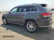 2014 Jeep Grand Cherokee Summit with VIN 1C4RJFJT6EC481846, listed as a Copart auction lot 71051545 with 216,706 mi miles and Salvage title. Bid and sale history available at DreamBid. Image 2.