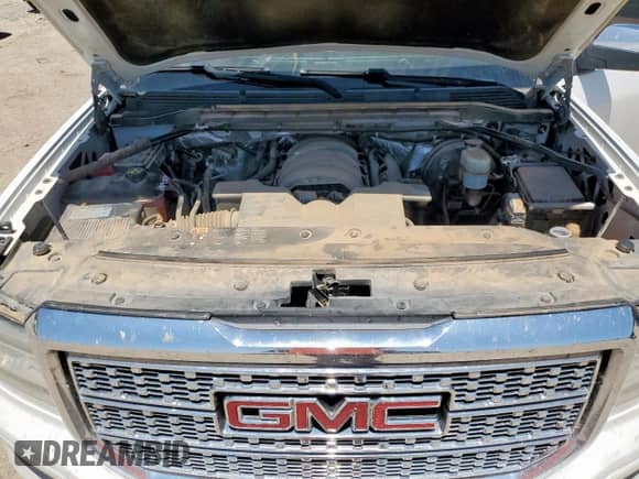 2016 GMC Sierra 1500 Denali z VIN 3GTU2PEJ1GG371793, wystawiony jako Copart lot #67460875 z przebiegiem 231 730 mil mil oraz Czysty tytuł • Clean title. Historia ofert i sprzedaży dostępna na DreamBid. Obrazek 11.