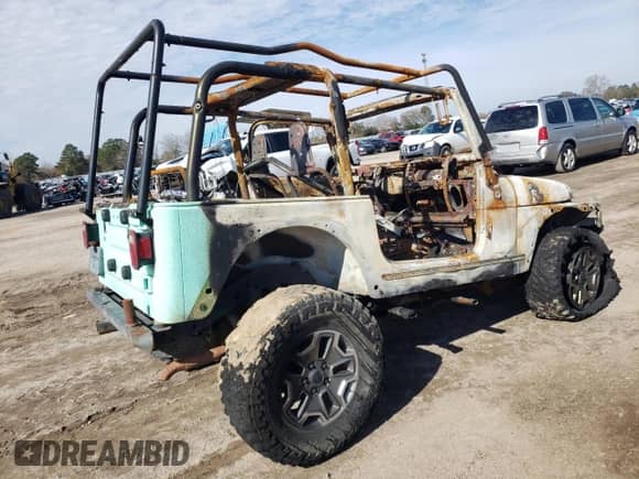 1997 Jeep Wrangler Sahara с VIN 1J4FY49S2VP526847, выставлен на аукционе Copart как лот 41883055 с пробегом Не указан миль и Списание • Salvage title. История ставок и продаж доступна на DreamBid. Изображение 3.