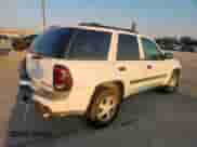 2002 Chevrolet TrailBlazer LTZ z VIN 1GNDT13S922181772, wystawiony jako Copart lot #80696325 z przebiegiem 174 705 mil mil oraz Szkoda całkowita • Salvage title. Historia ofert i sprzedaży dostępna na DreamBid. Obrazek 3.