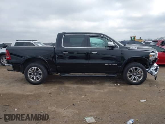 2019 Ram 1500 Longhorn with VIN 1C6SRFKT7KN518337, listed as a IAAI auction lot 41502569 with 76,226 mi miles and . Bid and sale history available at DreamBid. Image 13.