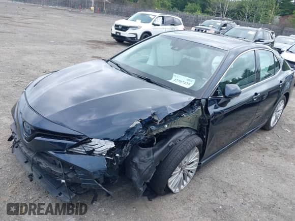 2020 Toyota Camry Hybrid XLE z VIN 4T1F31AK7LU521801, wystawiony jako IAAI lot #42707425 z przebiegiem 66 573 mil mil oraz . Historia ofert i sprzedaży dostępna na DreamBid. Obrazek 17.