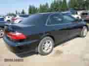 1998 Honda Accord EX with VIN 1HGCG1658WA049839, listed as a Copart auction lot 71241095 with 253,051 mi miles and Salvage title. Bid and sale history available at DreamBid. Image 3.