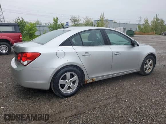 2014 Chevrolet Cruze 2LT with VIN 1G1PE5SB9E7406216, listed as a Copart auction lot 57094655 with 240,420 mi miles and Clean title. Bid and sale history available at DreamBid. Image 3.