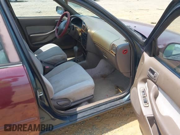 1996 Toyota Camry DX z VIN 4T1BG12K5TU928176, wystawiony jako IAAI lot #42902561 z przebiegiem 91 793 mil mil oraz . Historia ofert i sprzedaży dostępna na DreamBid. Obrazek 5.