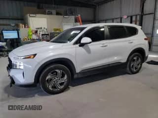 2021 Hyundai Santa Fe SE with VIN 5NMS14AJ9MH307290, listed as a Copart auction lot 71011165 with 67,707 mi miles and Salvage title. Bid and sale history available at DreamBid. Image 1.