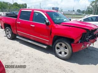 2018 Chevrolet Silverado 1500 LTZ z VIN 3GCUKSEC2JG303529, wystawiony jako IAAI lot #42894127 z przebiegiem 126 615 mil mil oraz . Historia ofert i sprzedaży dostępna na DreamBid. Obrazek 1.