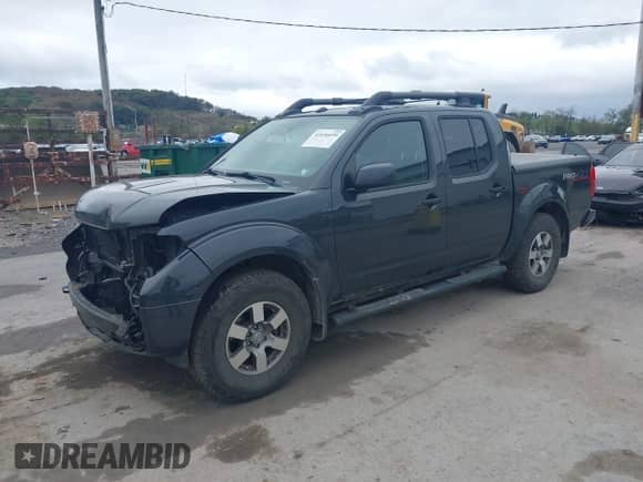 2011 Nissan Frontier Pro-4X with VIN 1N6AD0EVXBC449701, listed as a IAAI auction lot 43436699 with 223,651 mi miles and . Bid and sale history available at DreamBid. Image 2.
