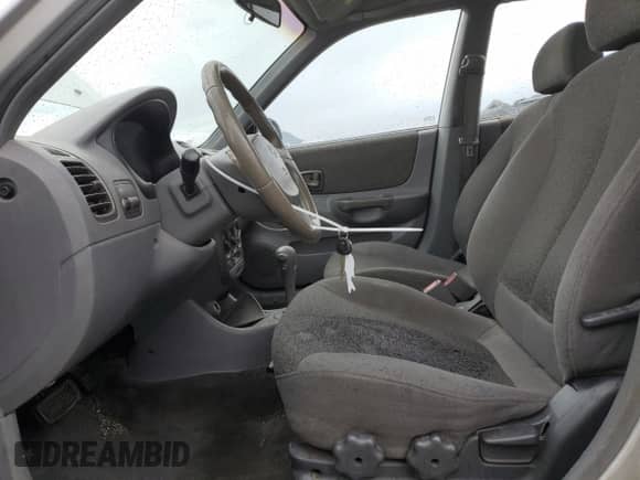 2000 Hyundai Accent with VIN KMHCG45G8YU120795, listed as a Copart auction lot 61005175 with 96,515 mi miles and Clean title. Bid and sale history available at DreamBid. Image 7.