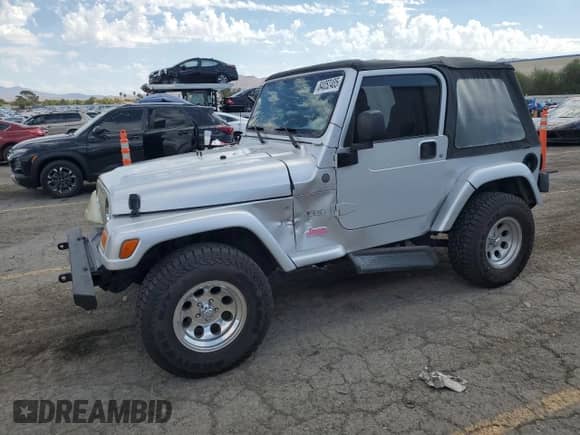 2004 Jeep Wrangler X z VIN 1J4FA39S04P739230, wystawiony jako Copart lot #84052405 z przebiegiem 97 855 mil mil oraz Szkoda całkowita • Salvage title. Historia ofert i sprzedaży dostępna na DreamBid. Obrazek 1.