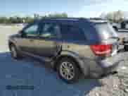 2014 Dodge Journey SXT with VIN 3C4PDCBG9ET142064, listed as a Copart auction lot 84588885 with 168,463 mi miles and Salvage title. Bid and sale history available at DreamBid. Image 2.