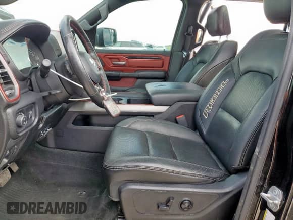 2020 Ram 1500 Rebel z VIN 1C6SRFLT6LN127034, wystawiony jako Copart lot #64791005 z przebiegiem 86 689 mil mil oraz Szkoda całkowita • Salvage title. Historia ofert i sprzedaży dostępna na DreamBid. Obrazek 7.