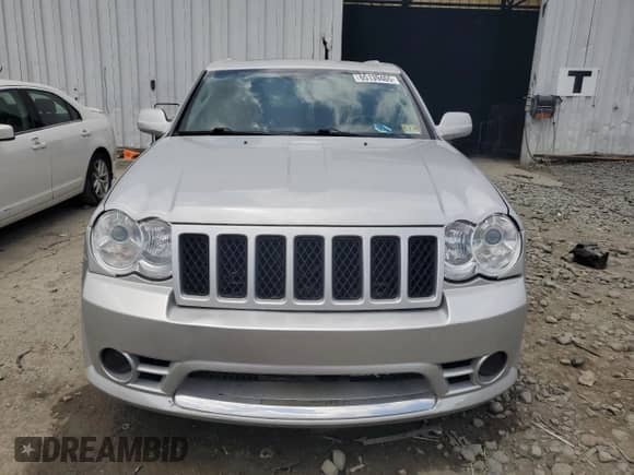 2008 Jeep Grand Cherokee SRT-8 z VIN 1J8HR78358C112621, wystawiony jako Copart lot #65139465 z przebiegiem Nie podano mil oraz Szkoda całkowita • Salvage title. Historia ofert i sprzedaży dostępna na DreamBid. Obrazek 5.