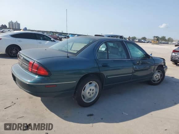 1998 Chevrolet Lumina with VIN 2G1WL52M7W9310815, listed as a Copart auction lot 59181775 with 93,661 mi miles and Salvage title. Bid and sale history available at DreamBid. Image 3.