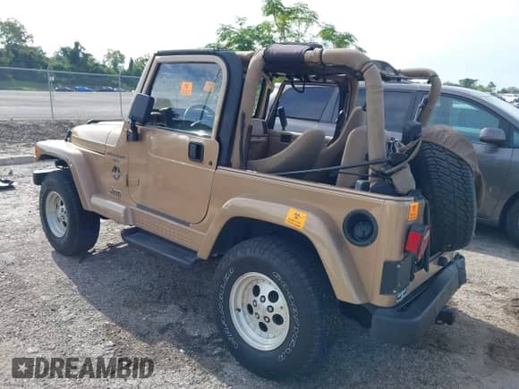 1999 Jeep Wrangler Sahara с VIN 1J4FY49S1XP428301, выставлен на аукционе IAAI как лот 43193956 с пробегом 55 579 миль миль и . История ставок и продаж доступна на DreamBid. Изображение 3.