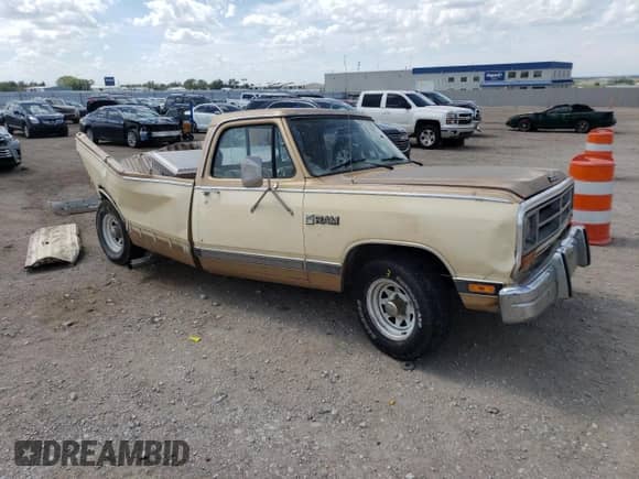 1987 Dodge Trucks with VIN 1B7HD14TXHS334781, listed as a Copart auction lot 69347244 with 69,244 mi miles and Salvage title. Bid and sale history available at DreamBid. Image 4.
