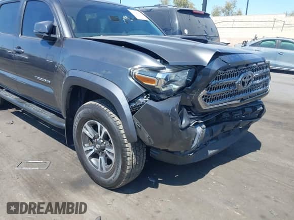 2016 Toyota Tacoma SR5 with VIN 3TMAZ5CNXGM009360, listed as a IAAI auction lot 43186084 with 89,490 mi miles and . Bid and sale history available at DreamBid. Image 12.