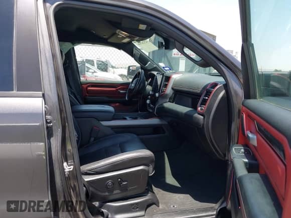 2020 Ram 1500 Rebel with VIN 1C6SRFLT1LN398728, listed as a IAAI auction lot 42526369 with 85,040 mi miles and . Bid and sale history available at DreamBid. Image 5.