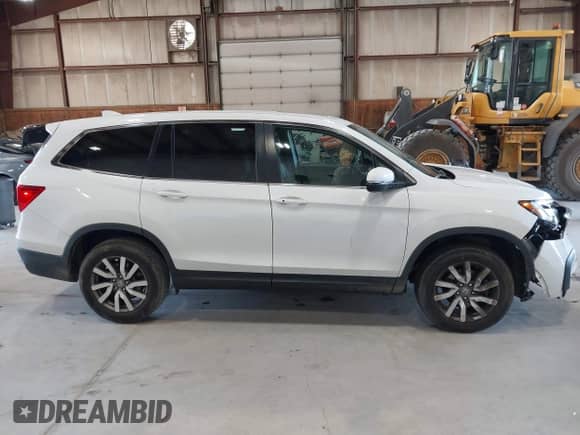 2022 Honda Pilot EX-L with VIN 5FNYF6H53NB081766, listed as a IAAI auction lot 42615459 with 39,878 mi miles and . Bid and sale history available at DreamBid. Image 13.
