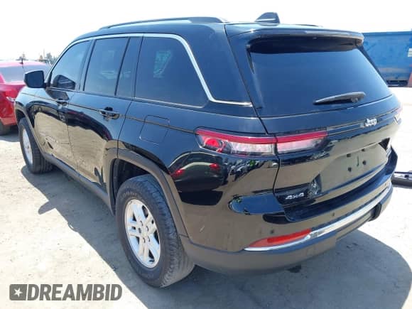 2022 Jeep Grand Cherokee Laredo z VIN 1C4RJHAG6N8572407, wystawiony jako IAAI lot #42342437 z przebiegiem 65 884 mil mil oraz . Historia ofert i sprzedaży dostępna na DreamBid. Obrazek 3.