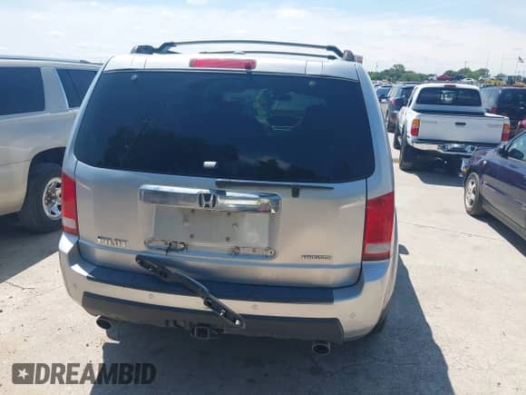 2010 Honda Pilot Touring with VIN 5FNYF3H94AB022723, listed as a IAAI auction lot 42378211 with 326,338 mi miles and . Bid and sale history available at DreamBid. Image 17.