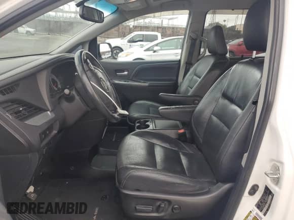 2015 Toyota Sienna SE with VIN 5TDXK3DC4FS663754, listed as a Copart auction lot 65745835 with 100,446 mi miles and Salvage title. Bid and sale history available at DreamBid. Image 7.