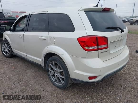 2013 Dodge Journey R/T z VIN 3C4PDCEG5DT642751, wystawiony jako IAAI lot #42306951 z przebiegiem 129 338 mil mil oraz . Historia ofert i sprzedaży dostępna na DreamBid. Obrazek 3.