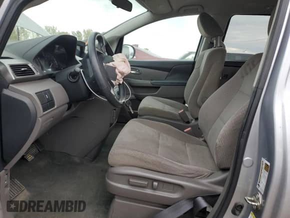 2016 Honda Odyssey LX with VIN 5FNRL5H26GB103453, listed as a Copart auction lot 86080625 with 97,833 mi miles and Salvage title. Bid and sale history available at DreamBid. Image 7.