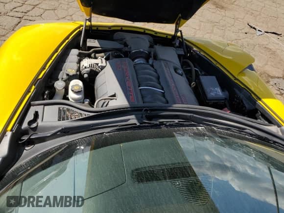2012 Chevrolet Corvette 1LT с VIN 1G1YE2DW4C5107678, выставлен на аукционе Copart как лот 72370944 с пробегом 34 843 миль миль и Списание • Salvage title. История ставок и продаж доступна на DreamBid. Изображение 11.