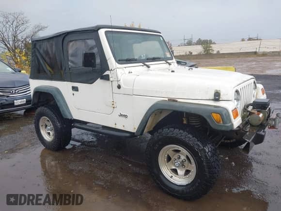 1999 Jeep Wrangler SE with VIN 1J4FY29P2XP461923, listed as a IAAI auction lot 43591392 with 198,022 mi miles and . Bid and sale history available at DreamBid. Image 1.